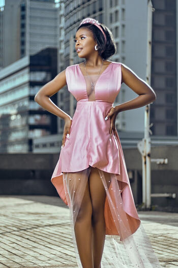 ‘Pink Cloud’ This light, airy piece was conceptualized for the quintessential beauty queen. Reflecting an air of innocence, this garment is intended to reimagine the typical pageant gown.